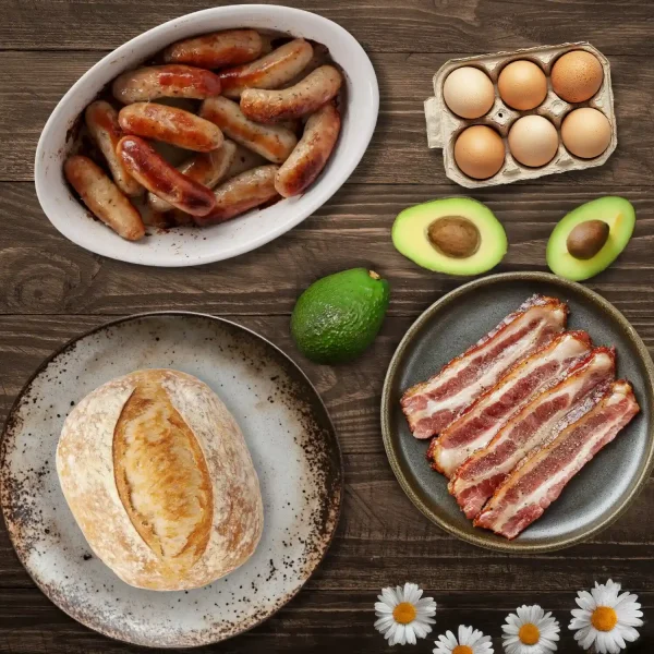 Breakfast Box With Sausages, Bacon, eggs and Avocado